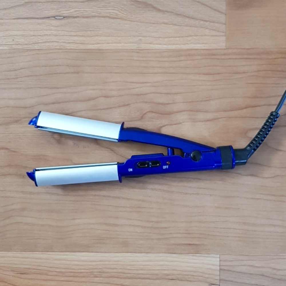 Travel-size Conair hair straightener